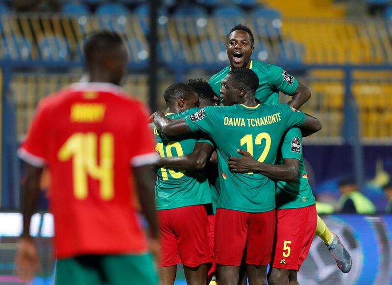 Soccer Football - Africa Cup of Nations 2019 - Group F - Cameroon v Guinea-Bissau - Ismailia Stadium, Ismailia, Egypt - June 25, 2019  Cameroon's Yaya Banana celebrates scoring their first goal with team mates     REUTERS/Amr Abdallah Dalsh