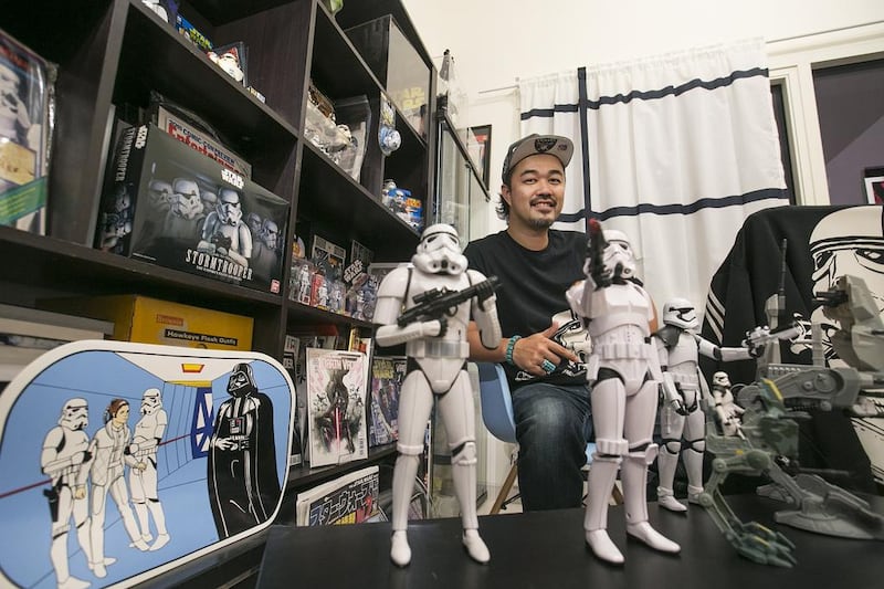Yuji Ueda, the founder of Tokyo Toy Films, with his Star Wars stormtroopers collection in Abu Dhabi. Mona Al Marzooqi/ The National 