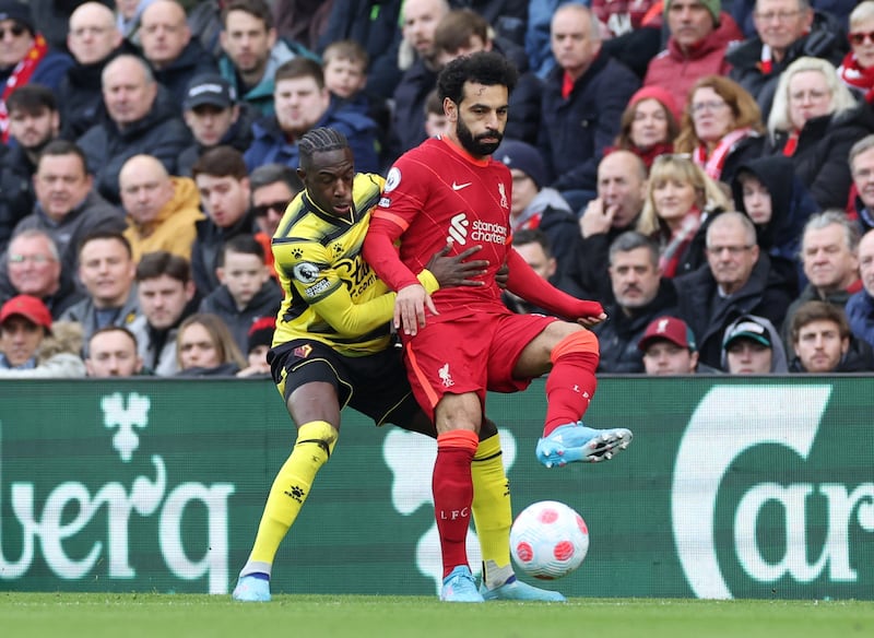 Liverpool attacker Mohamed Salah under pressure from Watford's Hassane Kamara. Reuters