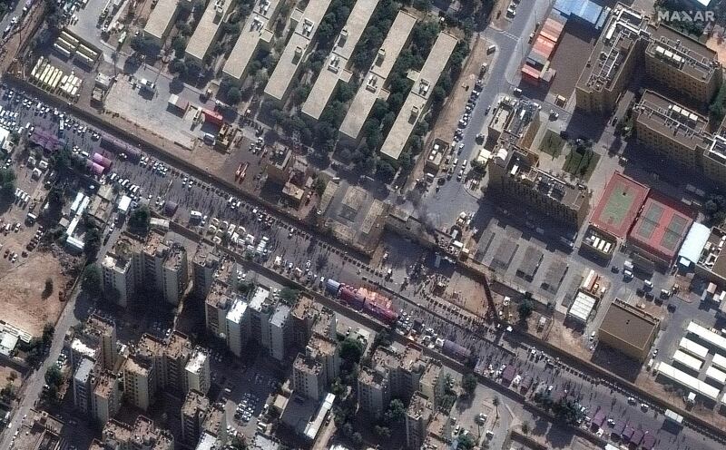 Members of an Iraqi Shiite armed group and their supporters gather at the eastern entrance of the US Embassy compound in Baghdad. EPA