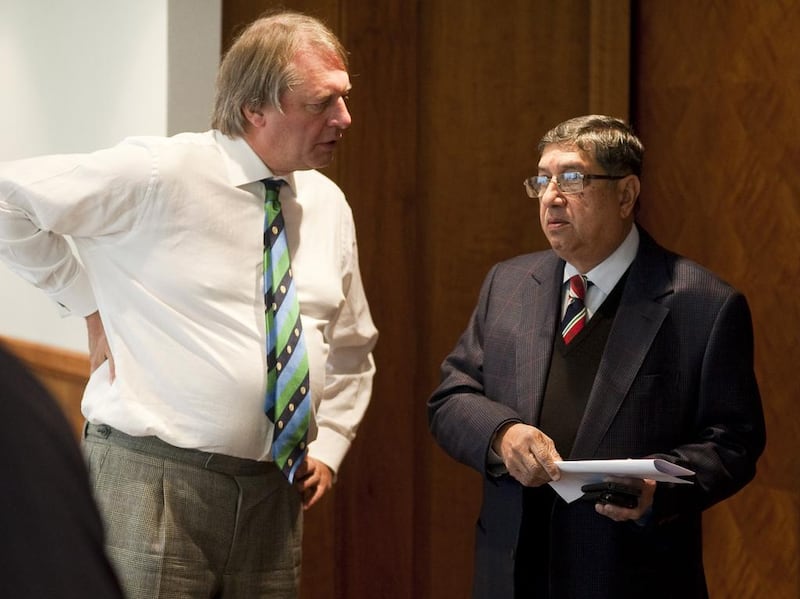 Giles Clarke, left, chairman of the England and Wales Cricket Board, speaks with incoming International Cricket Council chairman N Srinivasan during an ICC board meeting at The Royal Garden Hotel on October 18, 2013 in London. Charlie Crowhurst / Getty Images