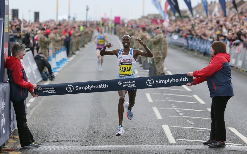 Britain's Mo Farah wins the men's elite race during the Great North Run in Newcastle, England, Sunday Sept. 10, 2017. (Richard Sellers/PA via AP)