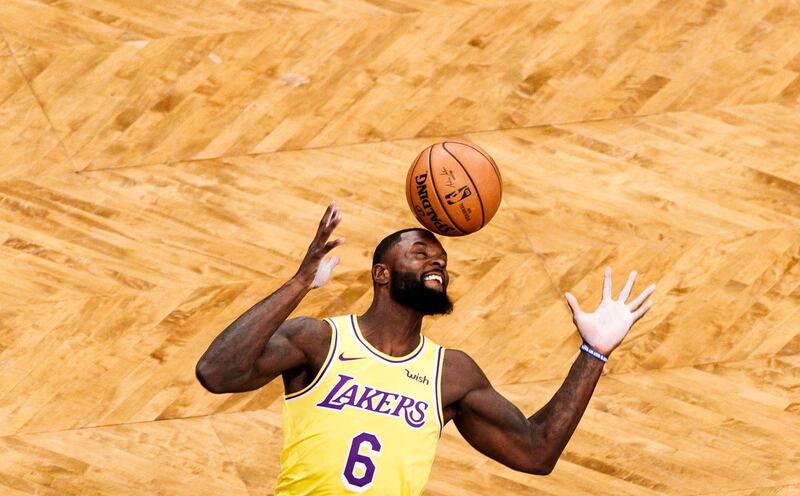 The Lakers' Lance Stephenson tries to grab the ball during an NBA match in Brooklyn, New York. EPA