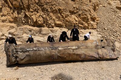 Ultra-Orthodox Jews move the shell of an intercepted Iranian missile, near the Israeli city of Arad, on April 30. Getty Images