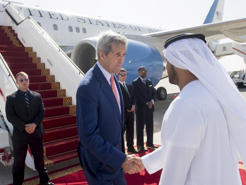 US Secretary of State John Kerry boards his plane after visiting Abu Dhabi. Saul Loeb / AFP Photo / June 9, 2016