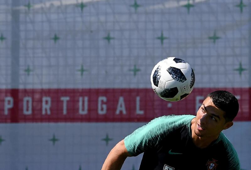Portugal's forward Cristiano Ronaldo controls a ball during a training session at the team's base in Kratovo, outside Moscow. Francisco Leong / AFP
