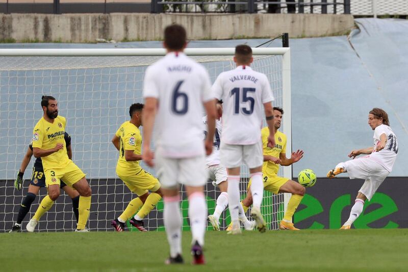 Luka Modric scores Real's second goal in their 2-1 win over Villarreal.