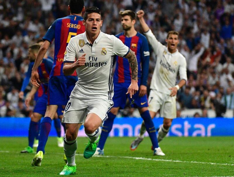 Real Madrid’s James Rodriguez celebrates after scoring to tie the match at 2-2 at the 85th minute. Pierre-Philippe Marcou / AFP