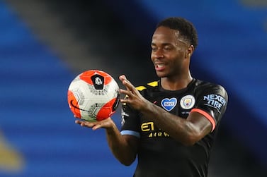 Manchester City's Raheem Sterling with the matchball after scoring a hat-trick against Brighton. Reuters
