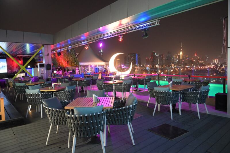 The High Note Pool and Sky Lounge at Aloft Al Mina offers extensive views of the Dubai skyline, perfect for watching New Year's Eve fireworks
