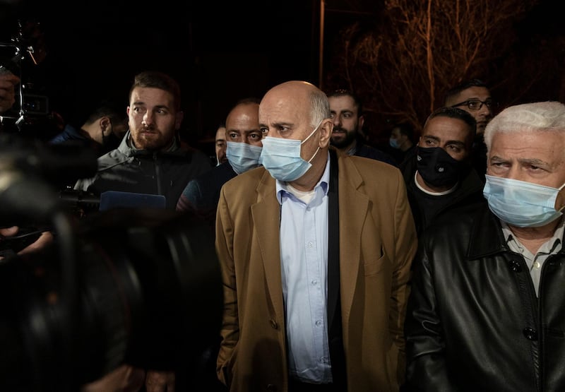 Senior Fatah official Jibril Rajoub, center, arrives at the Palestinian Central Election Commission office to register the party's official list for the upcoming parliamentary election in May, in the West Bank city of Ramallah, Wednesday, March 31, 2021. A popular Palestinian uprising leader imprisoned by Israel has submitted an independent list of candidates to run in the upcoming parliamentary elections. The last minute move by Marwan Barghouti could severely weaken the prospects of Mahmoud Abbas' Fatah party in the election and boost the Islamic militant Hamas group. (AP Photo/Nasser Nasser)