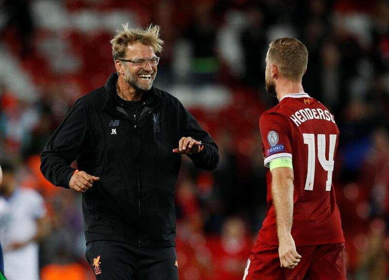 Soccer Football - Champions League - Playoffs - Liverpool vs TSG 1899 Hoffenheim - Liverpool, Britain - August 23, 2017   Liverpool manager Juergen Klopp and Jordan Henderson celebrate after the match    REUTERS/Phil Noble