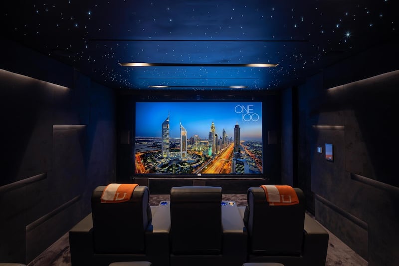 The indoor private cinema, which has an Imax screen, 4k projector and Dolby Atmos sound system. Courtesy Luxhabitat Sotheby's International Realty