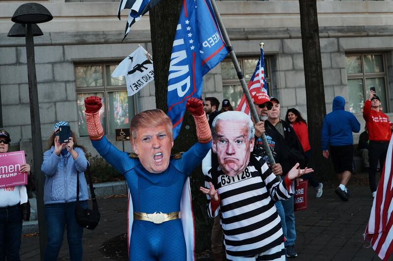 Two people dressed like US President Donald Trump and President-elect Joe Biden act as supporters of US President Donald Trump gather to support his legal challenges to the 2020 presidential election, in Freedom Plaza, in Washington, DC, US.  EPA