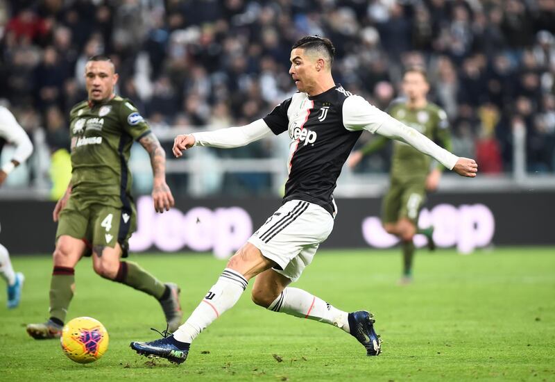 Cristiano Ronaldo scores Juventus' fourth goal to complete his hat-trick against Cagliari. Reuters