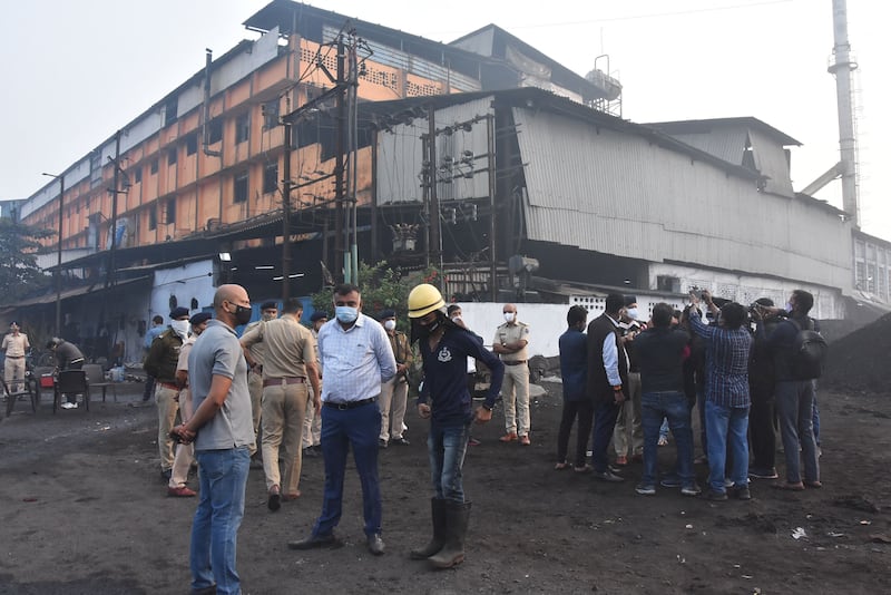 Police outside the Vishva Prem Mills in the Indian city of Surat in 2020, after a gas leak that killed six people. AFP