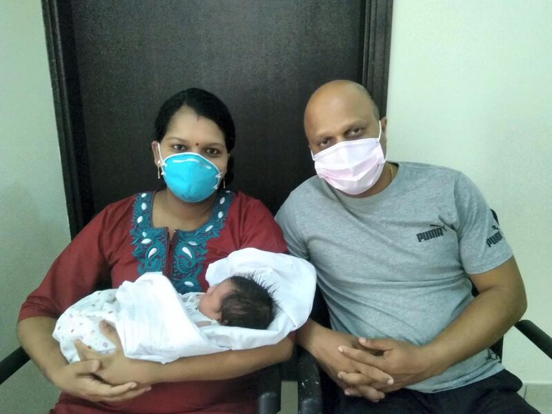 Soumya Devi and her husband Hari Prasad with their daughter Durga. The family went through a harrowing time when Soumya tested positive for Covid-19 days before the delivery. Courtesy: Hari Prasad