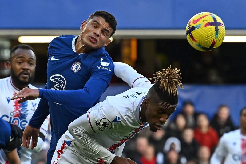 Blues defender Thiago Silva battles with forward Wilfried Zaha. AFP