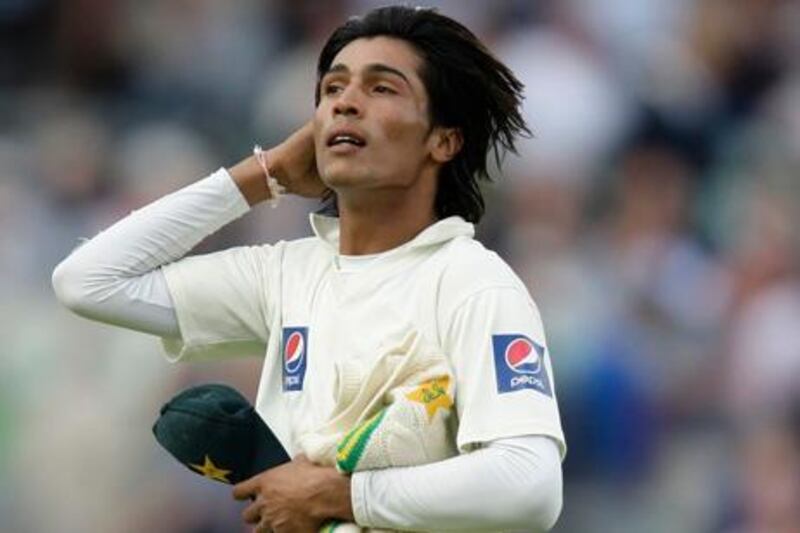Mohammad Amir of Pakistan gestures on the third day of their third NPower Test cricket match against England, at the Brit Oval in London on August 20, 2010.    AFP PHOTO/IAN KINGTON