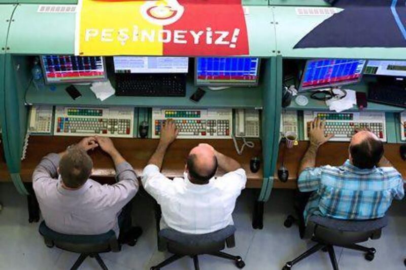 The benchmark National 100 Index of Borsa Istanbul has dived 10 per cent since the clashes between police and thousands of demonstrators seeking to halt the construction of a shopping mall on Istanbul's Gezi Park. Kerem Uzel / Bloomberg News
