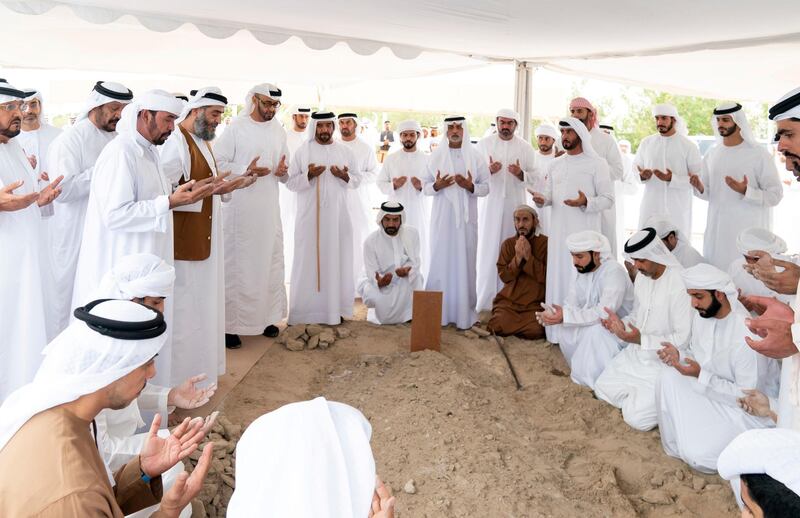 ABU DHABI, UNITED ARAB EMIRATES - November 20, 2019: HH Sheikh Mohamed bin Zayed Al Nahyan, Crown Prince of Abu Dhabi and Deputy Supreme Commander of the UAE Armed Forces (5th L) attends the burial of the late HH Sheikh Sultan bin Zayed Al Nahyan, UAE President's Representative. Seen with HH Sheikh Saif bin Mohamed Al Nahyan, HH Sheikh Ahmed bin Saif bin Mohamed Al Nahyan, HH Sheikh Nahyan bin Mubarak Al Nahyan, UAE Minister of State for Tolerance, HH Dr Sheikh Hazza bin Sultan bin Zayed Al Nahyan, HH Sheikh Hamed bin Zayed Al Nahyan and HH Dr Sheikh Khaled bin Sultan bin Zayed Al Nahyan.

( Mohamed Al Hammadi / Ministry of Presidential Affairs )
---