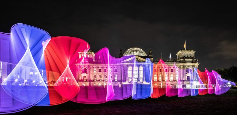 Patterns designed with a light stick in front of the Reichstag building in Berlin, Germany. Paul Zinken/AFP