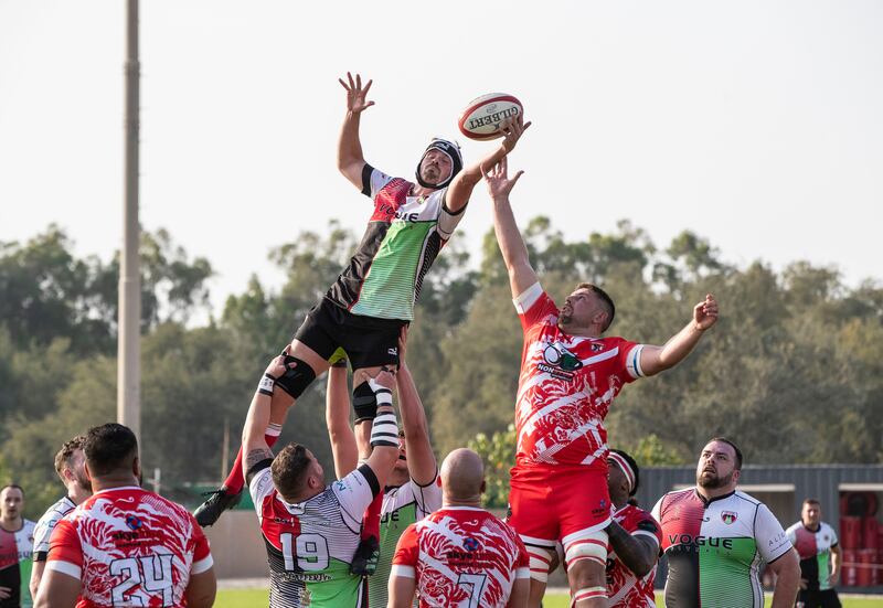 Lian Smit of Abu Dhabi Harlequins battles for the ball in the line-out with Rory Smith during the UAE Premiership semifinal at Dubai Police Academy.  All photos Ruel Pableo for The National