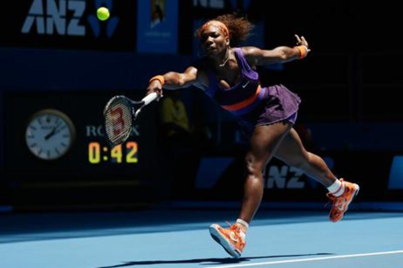 Serena Williams stretches to return a shot from Edina Gallovits-Hall at the Australian Open.