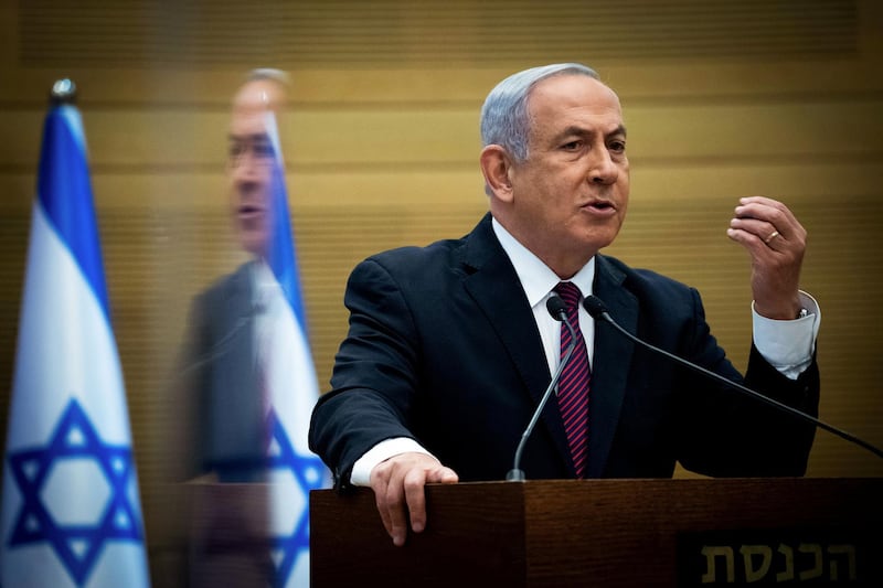 FILE PHOTO: Israeli Prime Minister Benjamin Netanyahu delivers a statement to Likud party MKs at the Knesset (Israel's parliament) in Jerusalem, December 2, 2020. Yonatan Sindel/Pool via REUTERS/File Photo