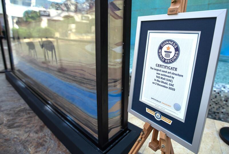 Abu Dhabi, United Arab Emirates, December 3, 2020.   A Guinness World Records certificate was given to Yas Mall for the largest "Sand Art Structure", yesterday, 2 December 2020.  Visitors may see this at the Town Square area, Yas Mall.
Victor Besa/The National
Section:  NA