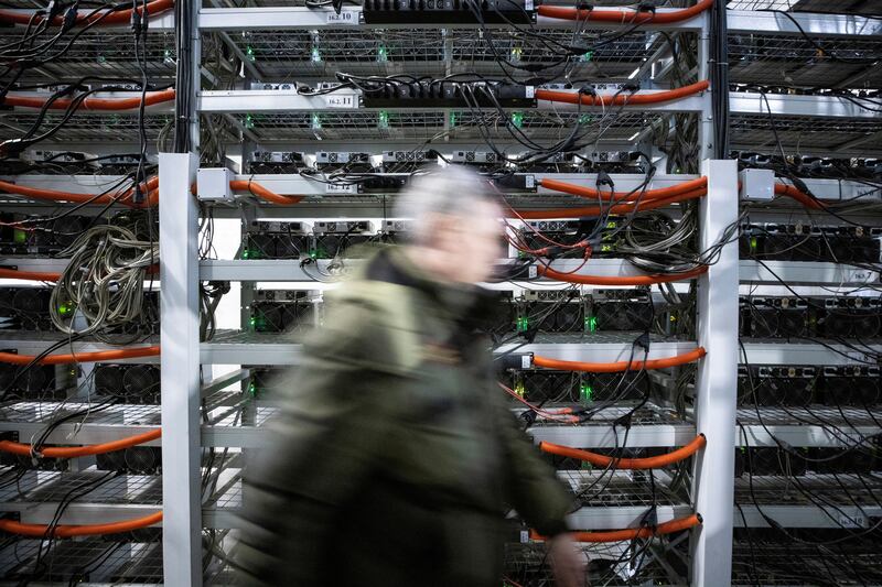 A cryptocurrency mining centre in the Russian city of Bratsk. Keeping energy costs and emissions down could add value to crypto assets. Reuters