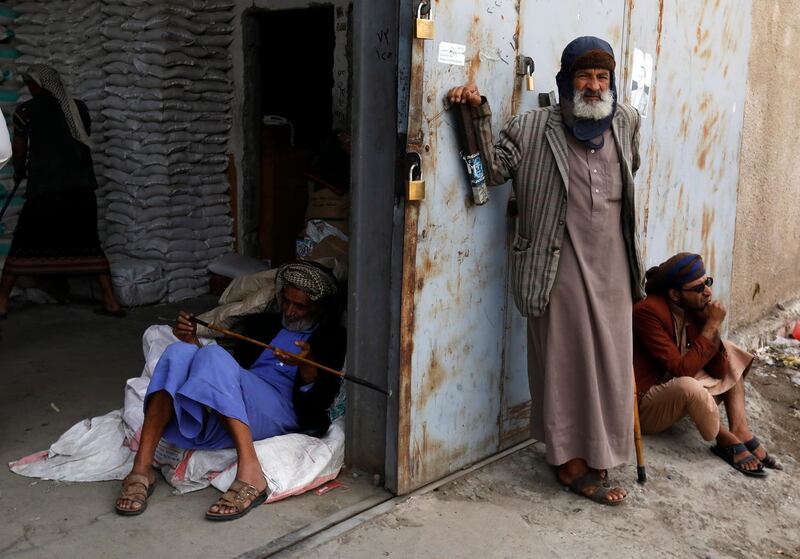 Members of the Yemeni Jewish community wait to get food supplies provided by Mona Relief Yemen, in Sana'a, Yemen. EPA