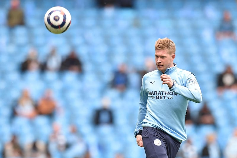 Manchester City's Belgian midfielder Kevin De Bruyne warms up for the English Premier League match against Everton at the Etihad Stadium in Manchester, north west England, on May 23, 2021. AFP