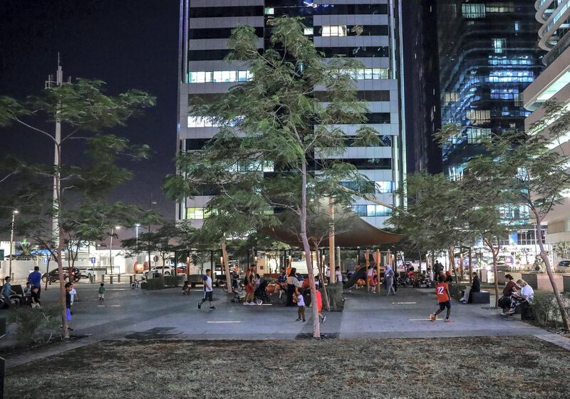 Abu Dhabi, U.A.E., November 5, 2018.   Neighbourhood: "Starbucks" - It goes by many names. Starbucks. New York. This small square in Khalidiya by Jones the Grocer and Al Ain Tower is a favourite for the city's youth, a safe place where girls and boys can meet away from the watchful eye of parents. 
Victor Besa / The National
Section:  NA
Reporter:  Anna Zacharias