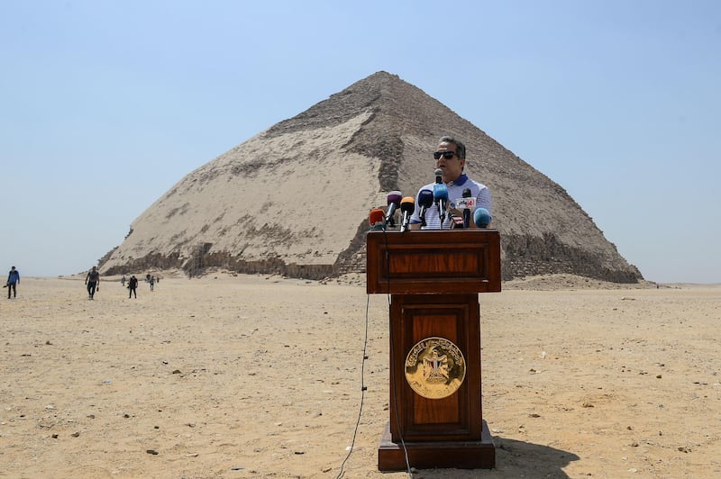 Egypt's Antiquities Minister Khaled El Enany speaks in front of the Bent Pyramid of Sneferu. AFP
