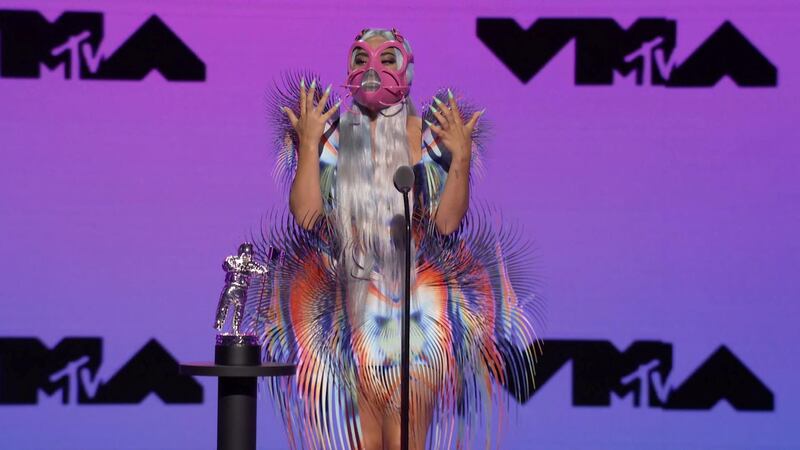 Lady Gaga accepts the award for Best Collaboration for 'Rain On Me' during the 2020 MTV VMAs. Reuters