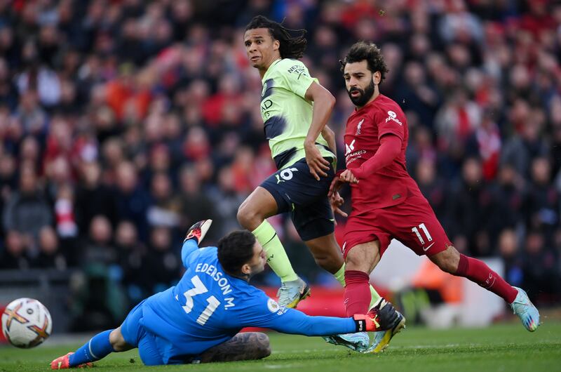 City keeper Ederson saves from Mohamed Salah of Liverpool. Getty