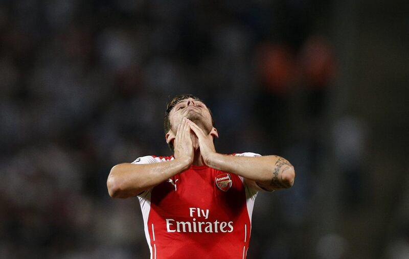 Olivier Giroud and Arsenal played to a scoreless draw with Besiktas in the first leg of their Champions Leg third qualifying round play-off. Tolga Bozoglu / EPA / August 19, 2014
