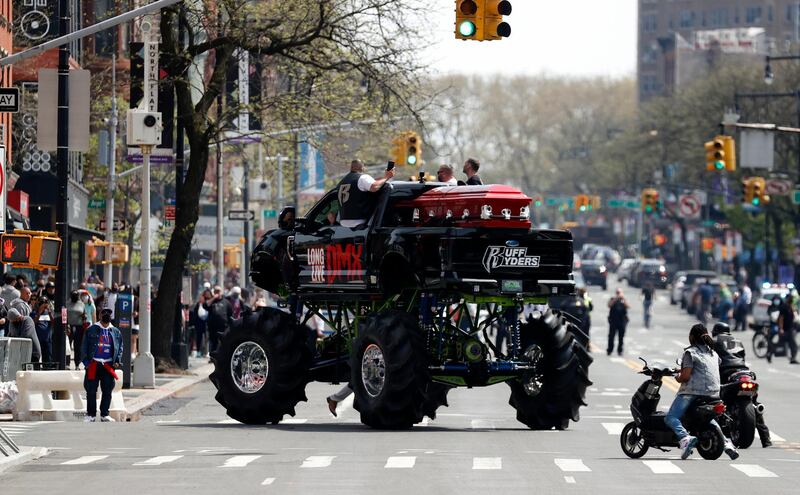 The casket of US rapper is seen on a monster truck on Flatbush avenue outside the Barclays Centre. EPA