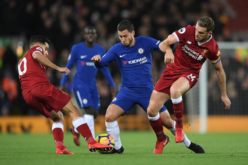 LIVERPOOL, ENGLAND - NOVEMBER 25:  Eden Hazard of Chelsea battles with Philippe Coutinho and Jordan Henderson of Liverpool during the Premier League match between Liverpool and Chelsea at Anfield on November 25, 2017 in Liverpool, England.  (Photo by Shaun Botterill/Getty Images)