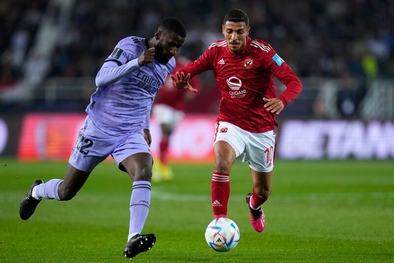 Real Madrid's Antonio Rudiger tussles with Al Ahly's Mohamed Sherif. AP