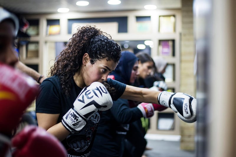 Women going through their exercise during a class in Mixed Martial Arts (MMA) in Giza, south-west of Cairo on the International Day for the Elimination of Violence Against Women.  EPA