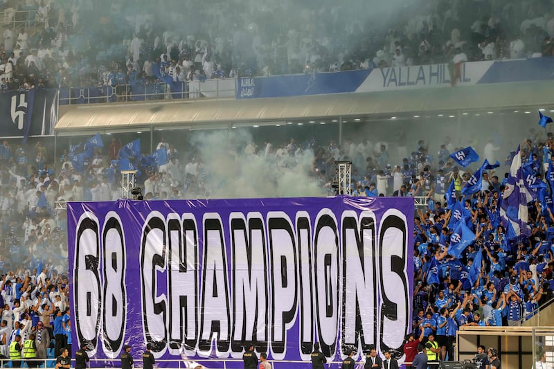 Al Hilal supporters cheer the title triumph. AFP
