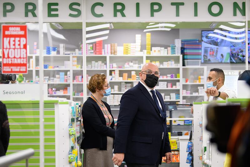 Mr Zahawi visits the Cullimore independent community chemist in Edgware after it became the first pharmacy in London to offer the Covid-19 vaccination in January 2021. Getty Images