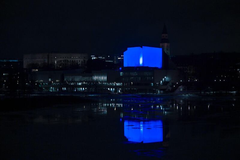 The 'Finlandia Hall' congress and event venue in the centre of Helsinki is  illuminated in dark blue lights to pay tribute, in Helsinki, Finland.  EPA