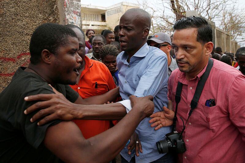 Jovenel Moise greets supporters after Hurricane Matthew swept through Haiti in October 2016.
