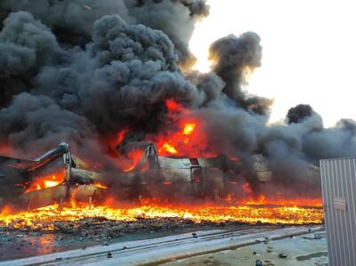 A warehouse is seen on fire after shelling in Sumy, Ukraine. Reuters