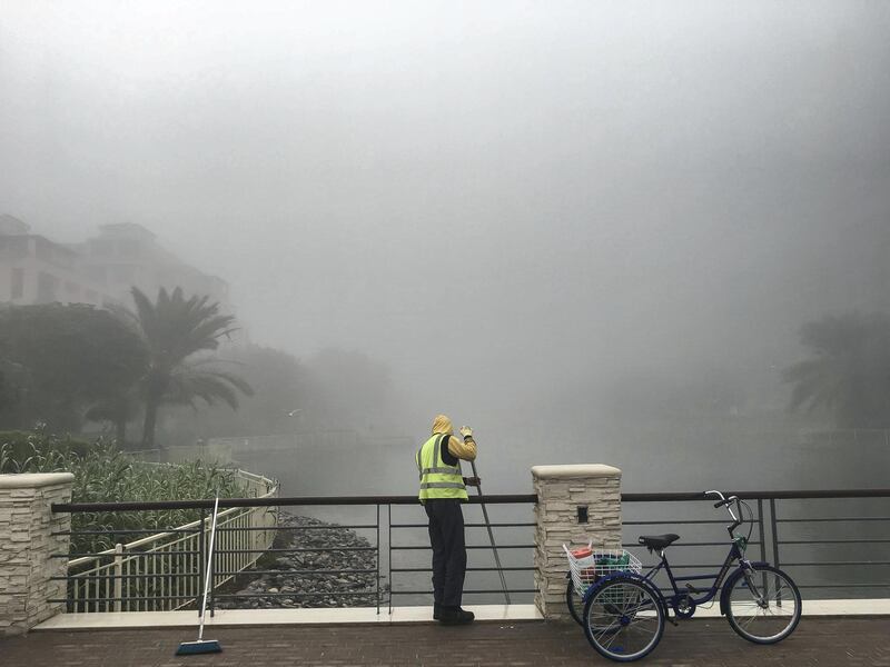 DUBAI, UNITED ARAB EMIRATES. 26 DECEMBER 2017. Early morning fog in The Greens, Dubai. Limited visibility but with conditions clearing up around 10:00am. (Photo: Antonie Robertson/The National) Journalist: None. Section: National.
