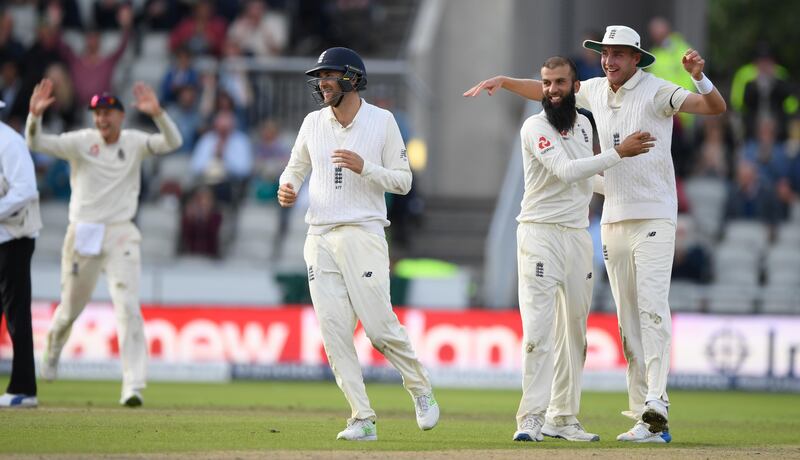 MANCHESTER, ENGLAND - AUGUST 07:  England bowler Moeen Ali is congratulated after taking the final South Africa wicket during day four of the 4th Investec Test match between England and South Africa at Old Trafford on August 7, 2017 in Manchester, England.  (Photo by Stu Forster/Getty Images)