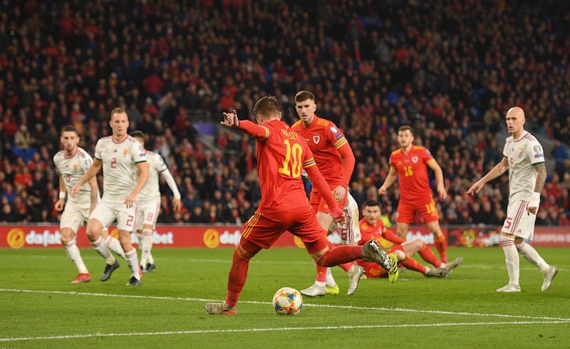 Aaron Ramsey of Wales scores his sides second goal .Getty